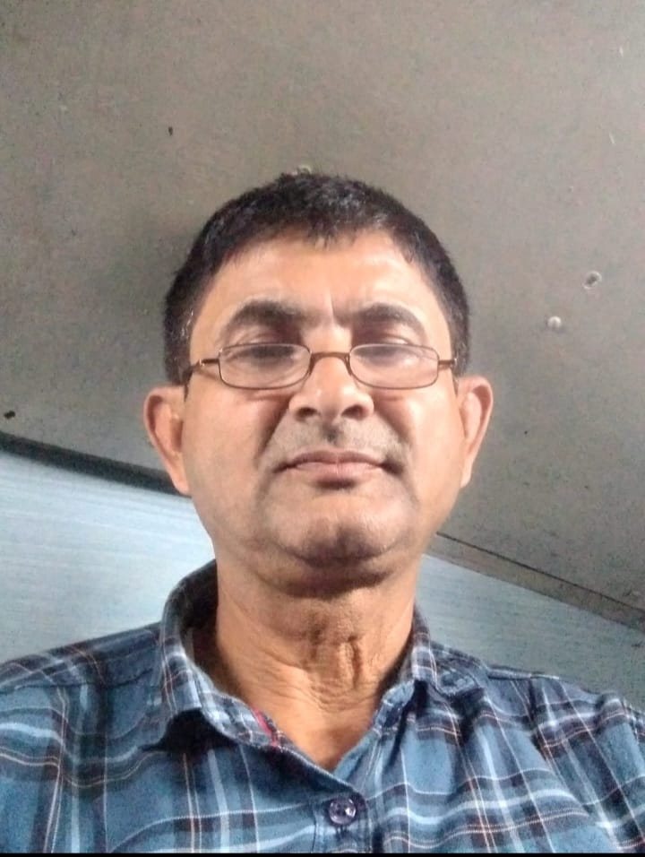 Mr Tilak oli Photo
